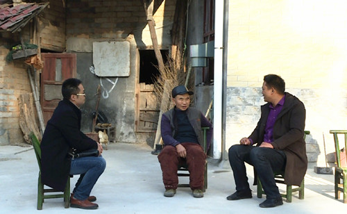 纪检扶贫人 情洒西山村